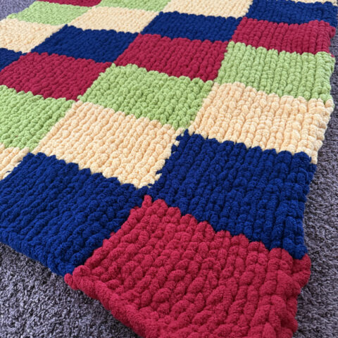 finger knit blanket with chunky yarn pattern