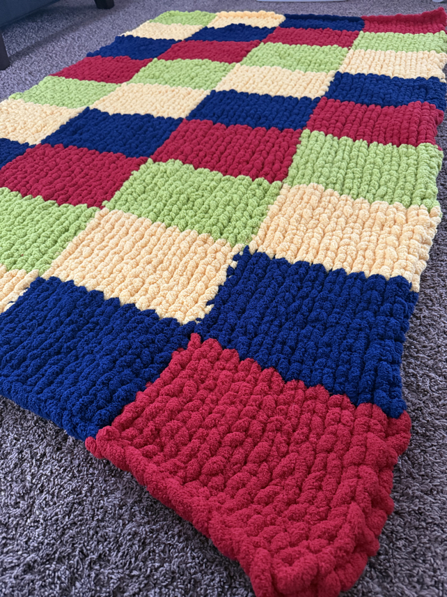finger knit blanket with chunky yarn pattern